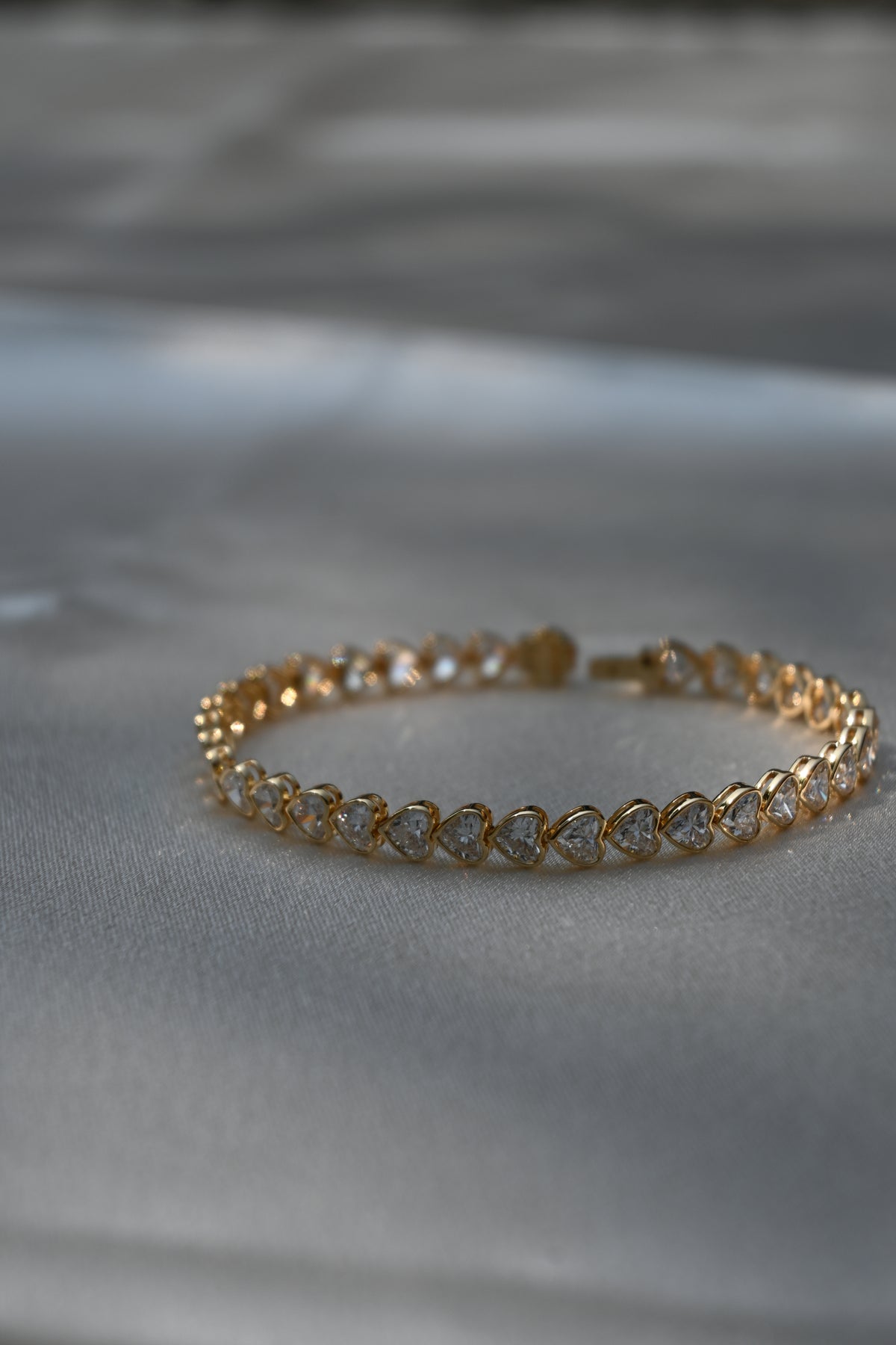 9.5ct Heart Tennis Bracelet in Bezel Setting