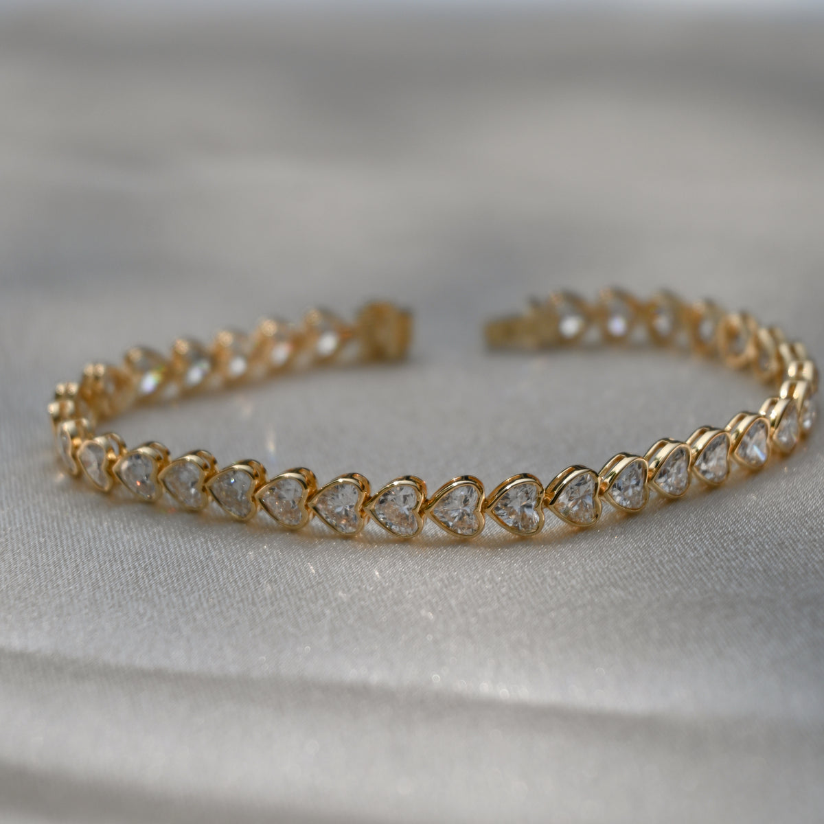 9.5ct Heart Tennis Bracelet in Bezel Setting